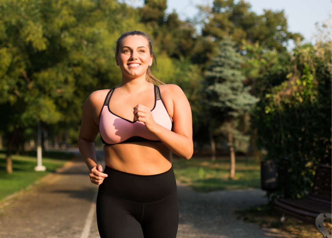 young-cheerful-plus-size-woman-in-pink-sporty-top-2023-11-27-05-35-03-utc